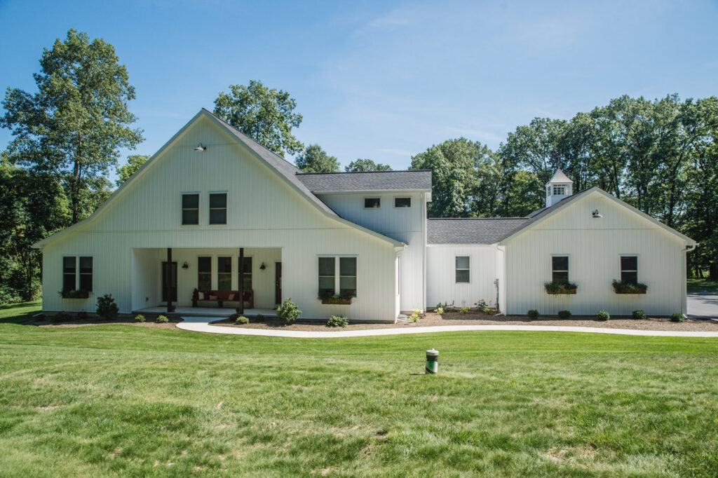 The exterior of a beautiful modern farmhouse style home built by Corrado Custom Homes, Inc. in Kutztown, PA
