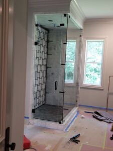 Modern glass shower enclosure installation project by Thermal Concepts, Inc in St. Louis, MO.