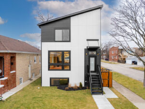 The striking exterior of a newly constructed or remodeled modern home by Inland Home Remodeling Inc. in Chicago, IL.