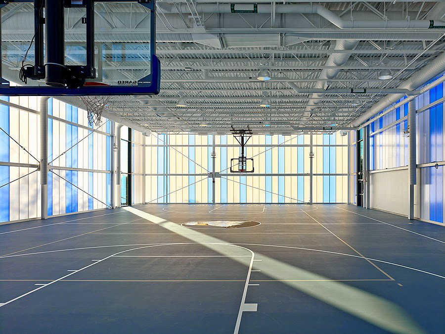 A modern indoor basketball court and sports facility, a project completed by Abacus Sports Installations, Ltd in Lancaster, PA.