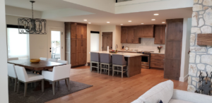 A beautifully renovated modern kitchen and dining room by CCS Tulsa, OK