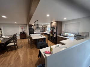 Modern kitchen and dining room renovation completed by Precision Coatings LLC Siding and Painting Specialist in Tacoma, WA.