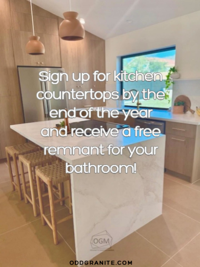 A modern kitchen featuring a large white stone island countertop installed by Oddonetto Granite & Marble LLC in Phoenix, AZ.