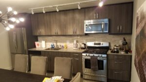 A beautifully renovated modern kitchen with new cabinets and appliances by Barry's Handyman Service in San Diego, CA.