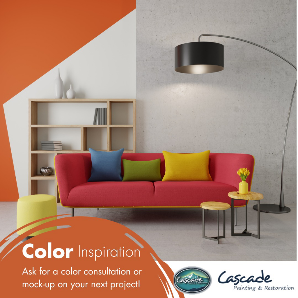 A modern living room with orange and white accent wall painting by Cascade Painting and Restoration in Portland, OR