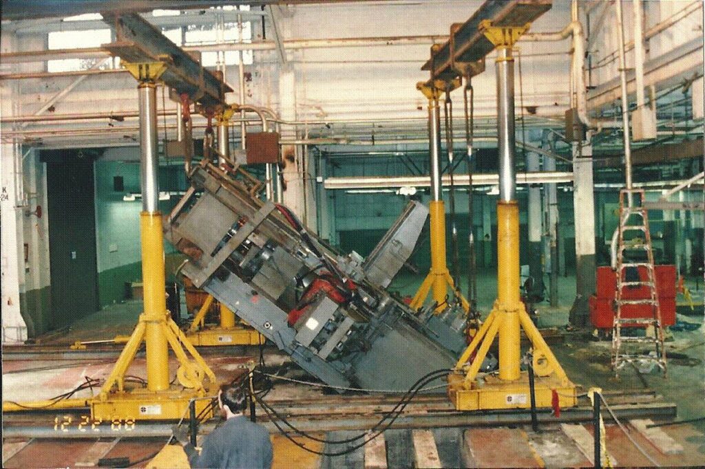 Tidewater Crane & Contracting moving industrial machinery with hydraulic lifts in Virginia Beach, VA