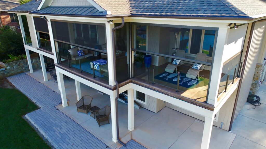 A beautiful multi-level screened porch and patio enclosure completed by Screen Enc in Denver, NC