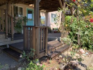 A multi-level wooden deck with integrated stairs, designed and built by Dan's Home and Yard in Oakland, CA.