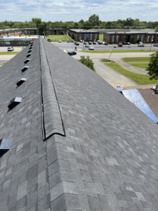 A newly installed asphalt shingle roof with vents by Brother George Remodeling & Construction in Louisville, KY.