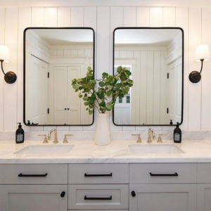 A newly installed modern bathroom vanity with double sinks, mirrors, and wall sconces by Valley Wide Design & Build in San Tan Valley, AZ.