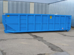 A clean, new blue dumpster ready for delivery or placement for a junk removal project by Massie Dumpster Rental in Las Vegas, NV.