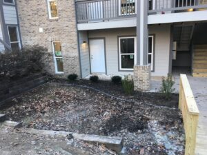 Exterior of a newly constructed building with fresh landscaping by Isac's General Services LLC in Henrico, VA