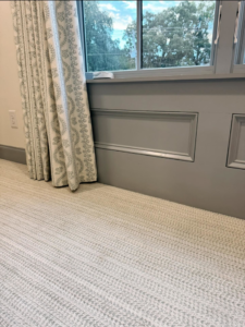 Newly installed carpet, baseboards, and wainscoting by Williamson Flooring & Design Center in Rock Hill, SC