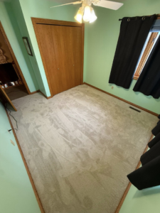 Professional new carpet installation in a bedroom by Johnson's Flooring Solutions LLC in Rochester, MN