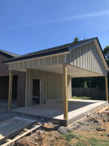 A newly constructed carport or covered patio structure by Brother George Remodeling & Construction in Louisville, KY.