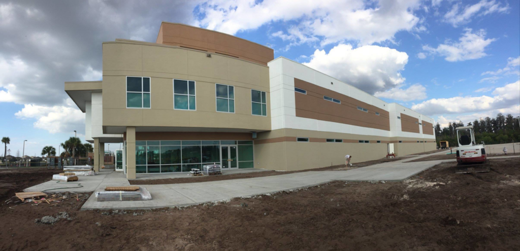 Newly constructed modern commercial building with ongoing site work by Florida SIP Panels by ACS, Inc. in Tampa, FL
