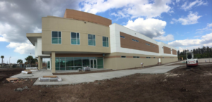 Newly constructed modern commercial building with ongoing site work by Florida SIP Panels by ACS, Inc. in Tampa, FL