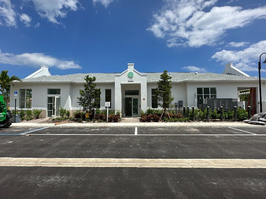 The exterior of a newly constructed commercial building with modern landscaping by Florida Palm Construction, Inc. in Davie, FL