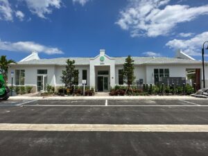 The exterior of a newly constructed commercial building with modern landscaping by Florida Palm Construction, Inc. in Davie, FL