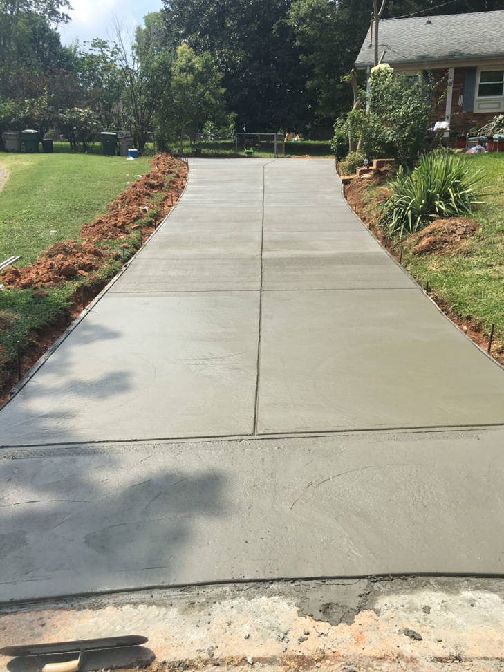A newly installed concrete driveway by Allen's Concrete Finishing in Rock Hill, SC.