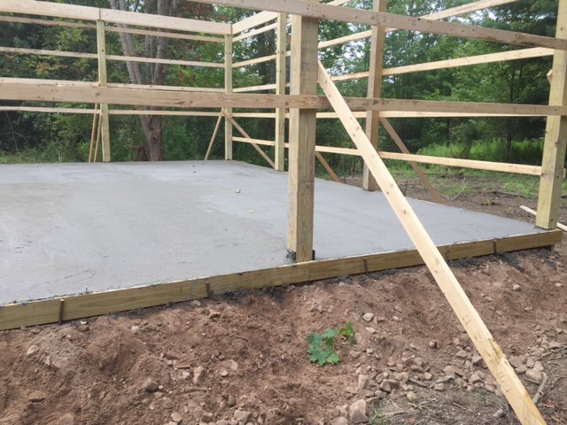 A new concrete slab foundation poured with wooden framing for a structure by Carl Gardner Contracting in Syracuse, NY.