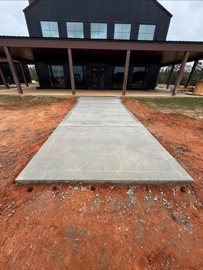 A newly poured concrete walkway installation by S&B Construction Services in Shreveport, LA.