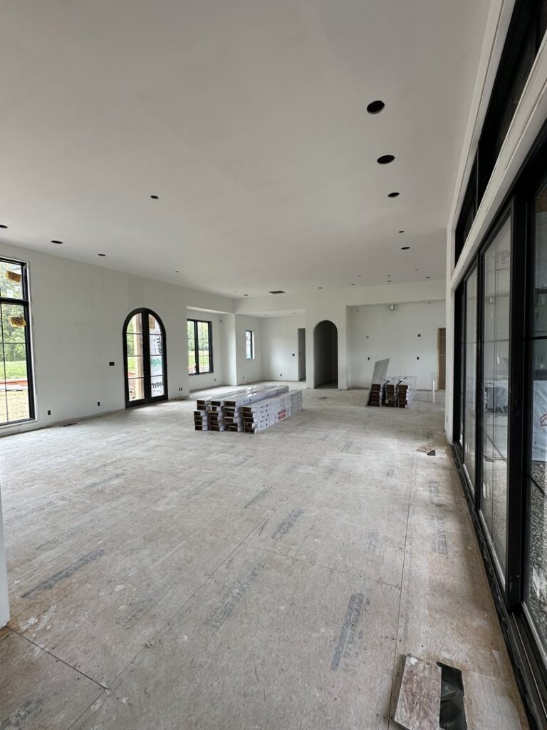 Newly installed drywall completed in a large room during new construction by Hahn Brothers Drywall Co Inc in Evansville, IN