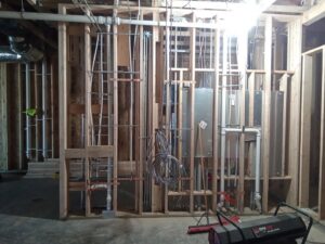 New construction framing with extensive plumbing and electrical rough-in by Top-Notch Plumbing, Heating & Air in Greeley, CO.