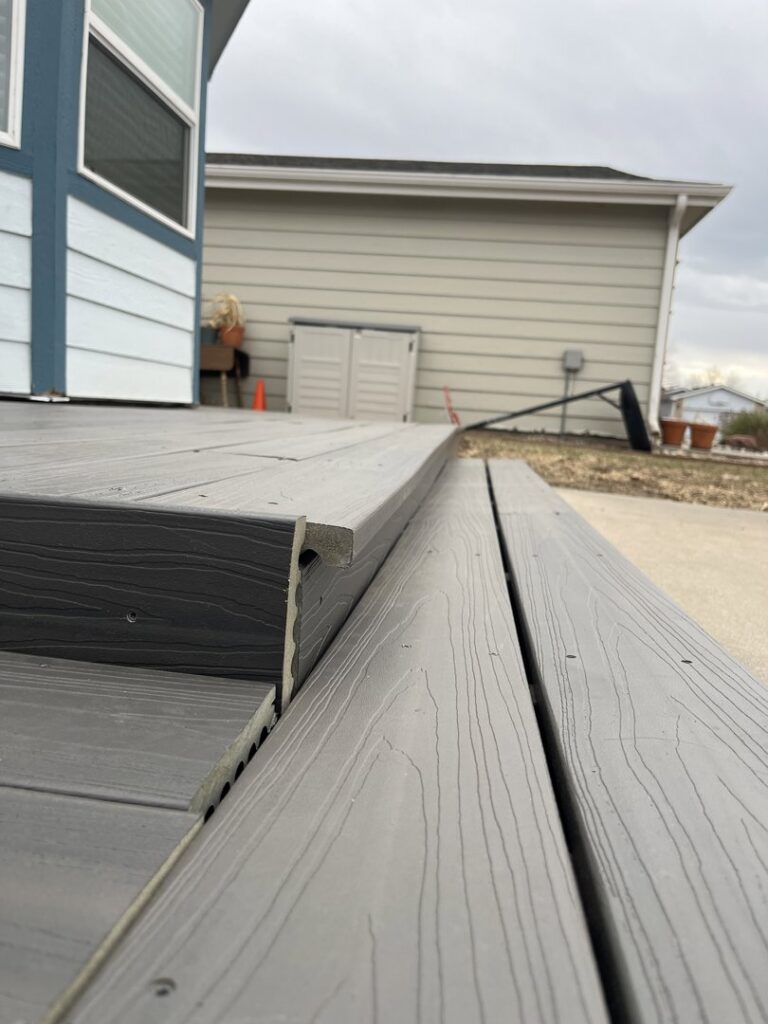 A newly installed or repaired composite deck edge, showcasing quality craftsmanship by Handyman Connection of Fort Collins in Fort Collins, CO