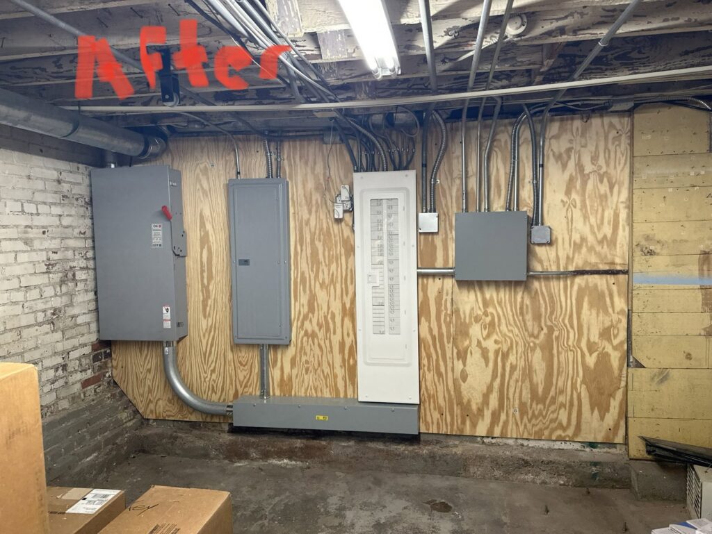 A newly installed and organized electrical panel system by Vakulskas Electric in Sioux City, IA.