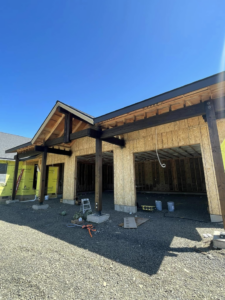 Exterior framing and sheathing of a new garage under construction by Palma's Painting & Misc. in Corvallis, OR.
