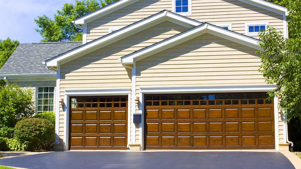 New garage door installation on a residential home by Harold Carpenter Overhead Door inc in Oshkosh, WI.