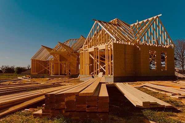 New home construction framing in progress by JP Construction in San Antonio, TX.