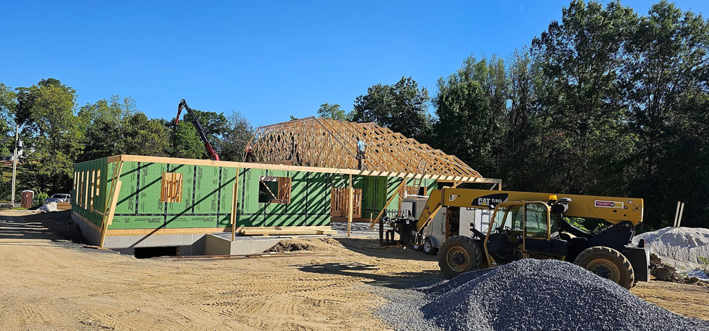 New home construction with framing and sheathing in progress by Susquehanna Valley Builders in Harrisburg, PA.