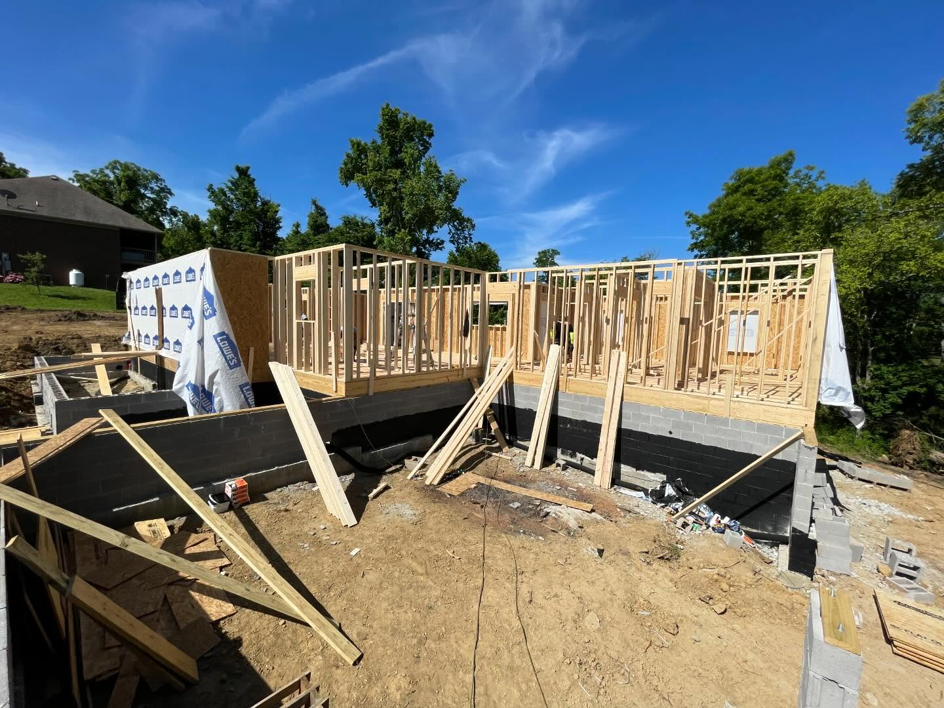 New home construction showing foundation and wall framing by Cord Construction in Winchester, KY