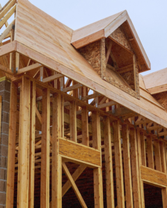 The sturdy wooden framing of a new house under construction by Pjai Projects in Nashville, TN