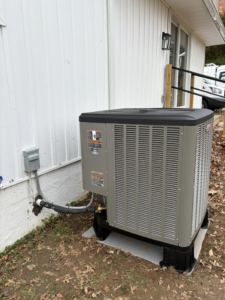 A newly installed Lennox outdoor air conditioning unit by Fletchers Plumbing and Heating in Smyrna, DE