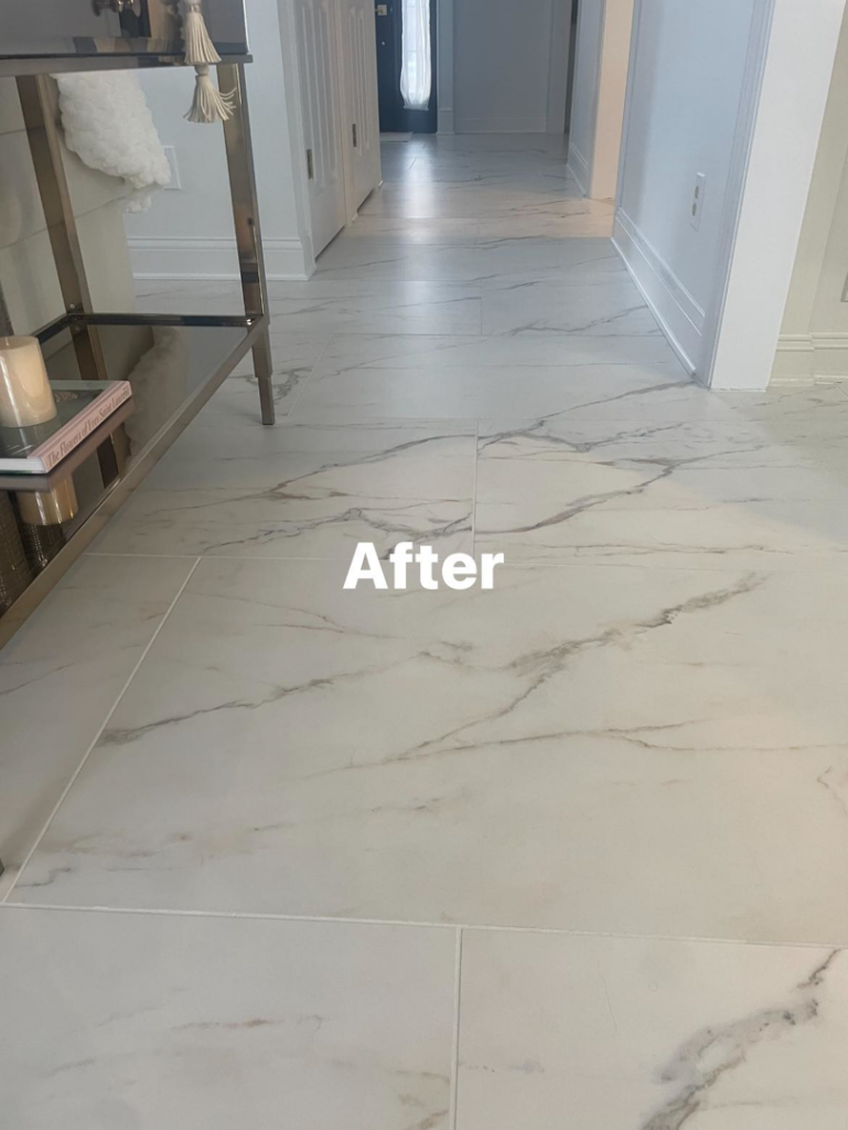 Newly installed white marble-look tile flooring in a hallway by Ray's construction in St. George, UT.