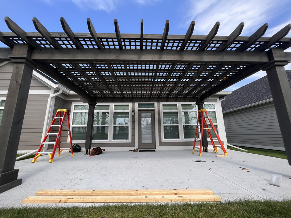 A newly constructed pergola over a concrete patio by McDonald Residential Contracting in Ames, IA.