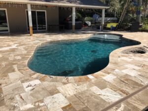 New pool and patio pavers installation by Grime Fighters of Tampa Bay, Inc in Belleair, FL.
