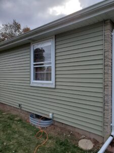 The completed exterior of a home with newly installed siding, a project by GCB Home Improvement in Appleton, WI.