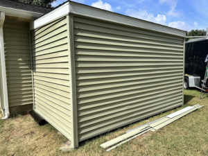 Newly installed siding on a building by Donald Home Improvements, llc in Milford, DE.