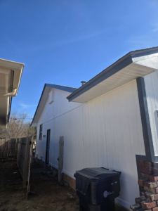 New siding installation on a house exterior by Complete Renovations in Bethany, OK