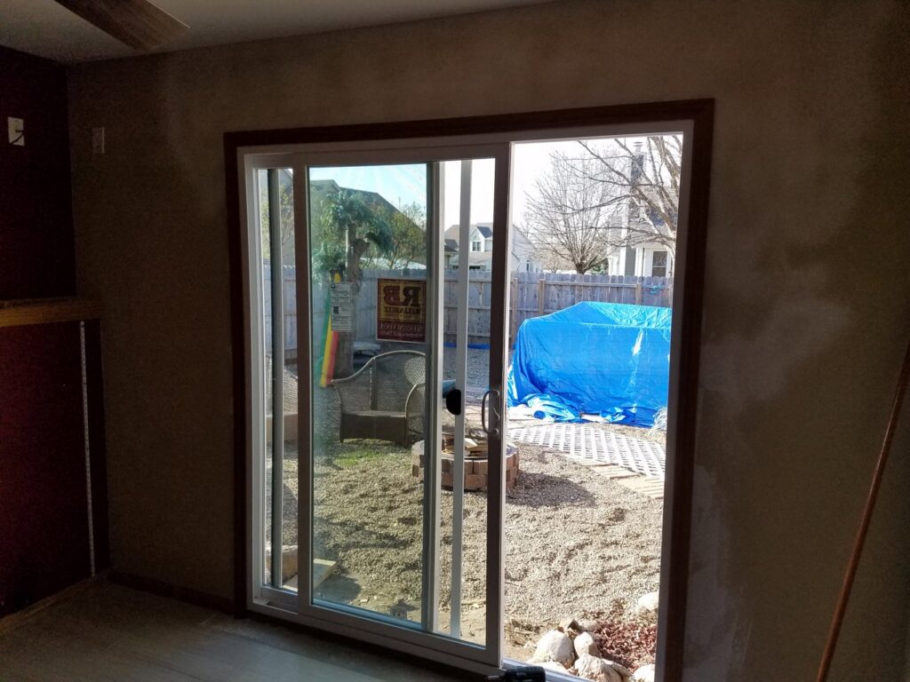 A new sliding glass door installed in a home by Rosewalls Handyman & Remodeling in Des Moines, IA.