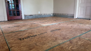 A room with new TruFlor subflooring installed, part of an interior renovation project by HW Handyman Services in Springfield, MO.