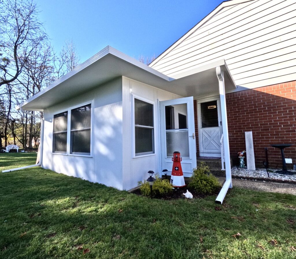 A newly constructed sunroom addition to a home by Stanley Contracting in Whiting, NJ