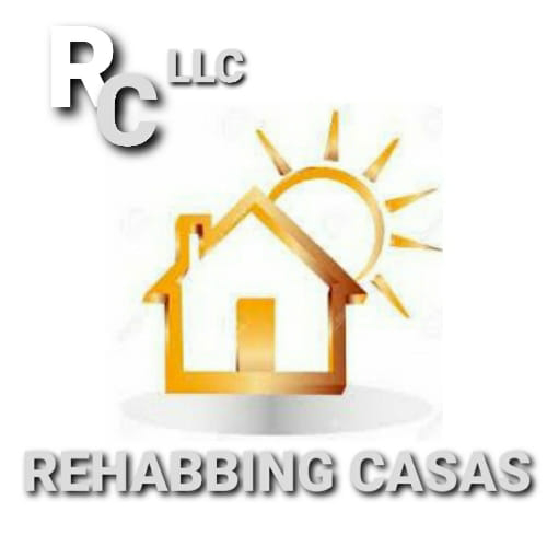 A new Trane outdoor AC unit being installed by Rehabbing CASAS in Phoenix, AZ