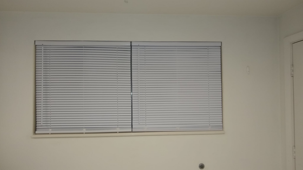 New white window blinds installed by Shane's Handyman Service in Edmond, OK.