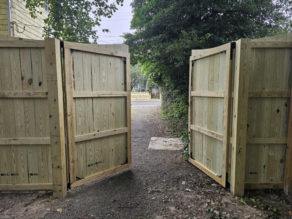 New wooden fence gate installation by A Man Who Can LLC, providing quality handyman services in Milford, DE.