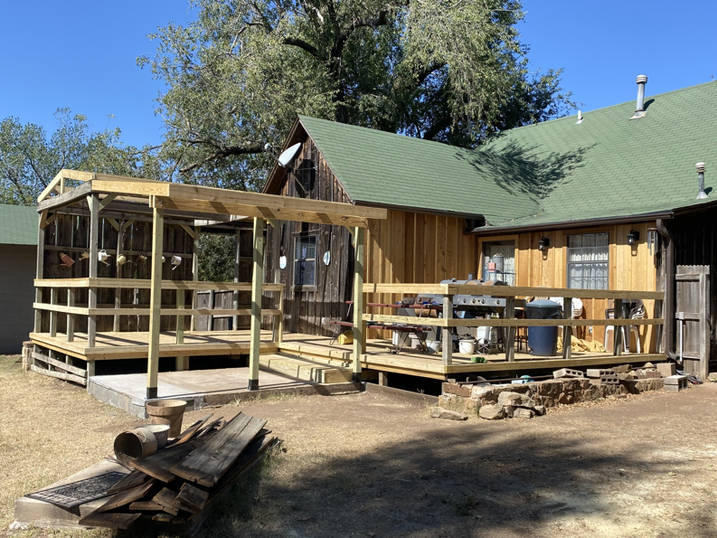 New wooden deck and pergola construction by Hansen Construction Stillwater in Stillwater, OK.